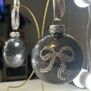 Glittering Silver Ornament with Rhinestone Bow